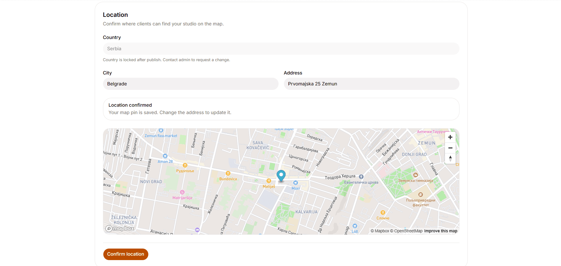 Owner location setup with address fields, confirmed map pin and Mapbox map